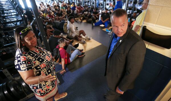 McEachern high school principal, Regina Montgomery (left) takes Cobb County Schools Superintendent, Chris Ragsdale (right) on a tour of the school. Cobb County schools started back to school Monday, July 31, 2017. 