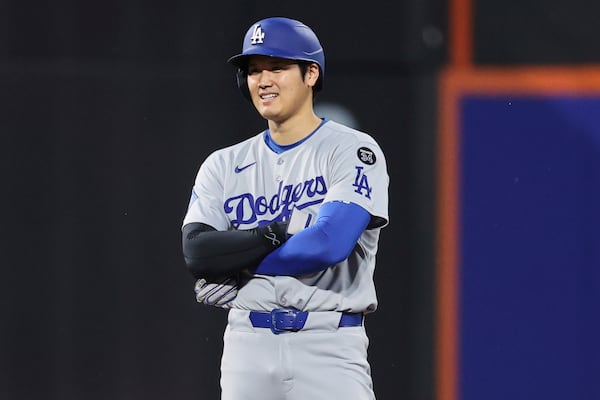 Los Angeles Dodgers' Shohei Ohtani stands on second base during the third inning of a baseball game against the New York Mets Friday, May 23, 2025, in New York. (AP Photo/Pamela Smith)