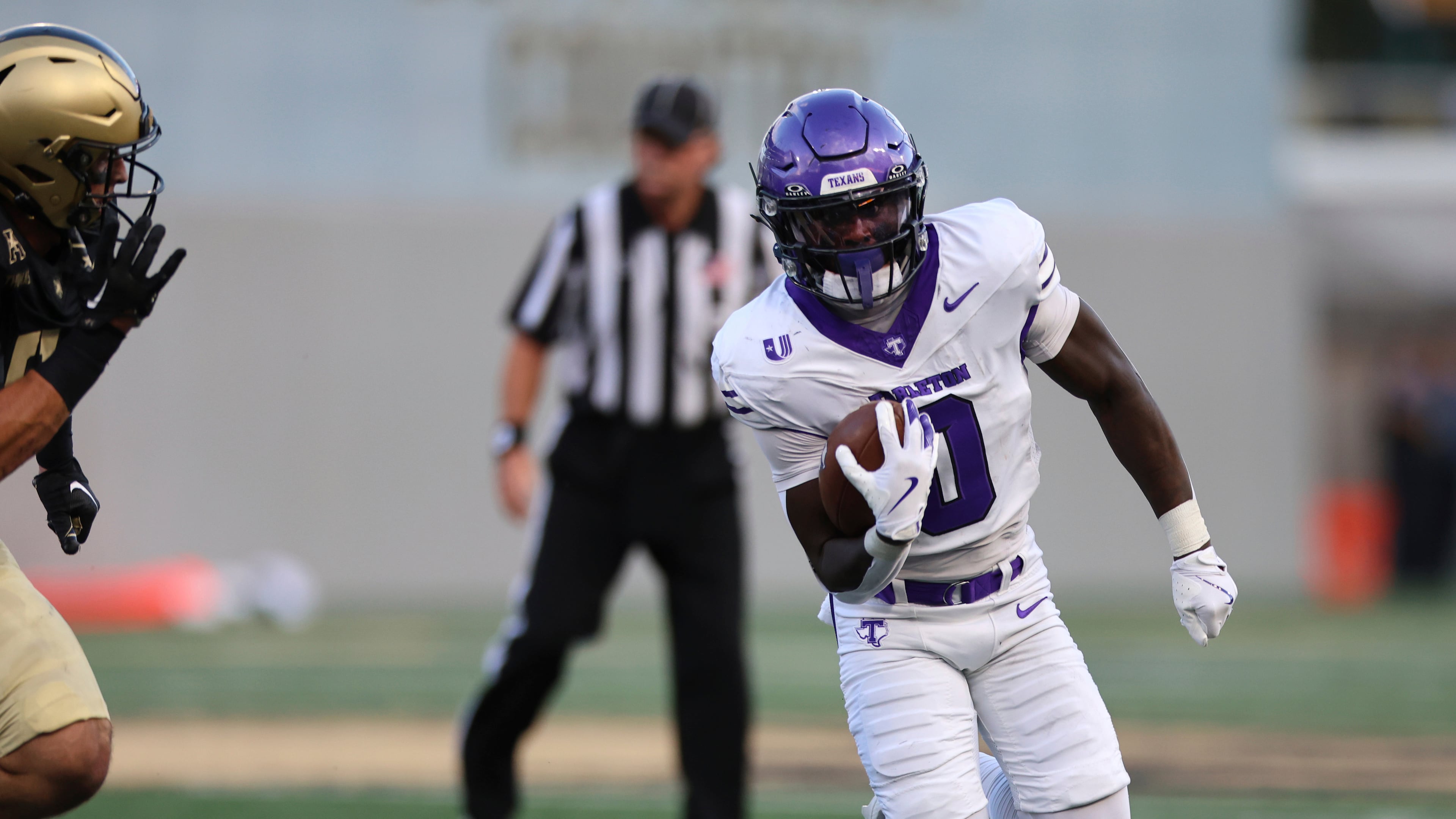 Tarleton State's Tre Page III runs the ball during an NCAA football game on Friday, Aug. 29, 2025, in West Point, N.Y. Page, a former Langston Hughes Panther, played a key role in college football’s biggest upset of the season so far. (Gregory Payan/AP)
