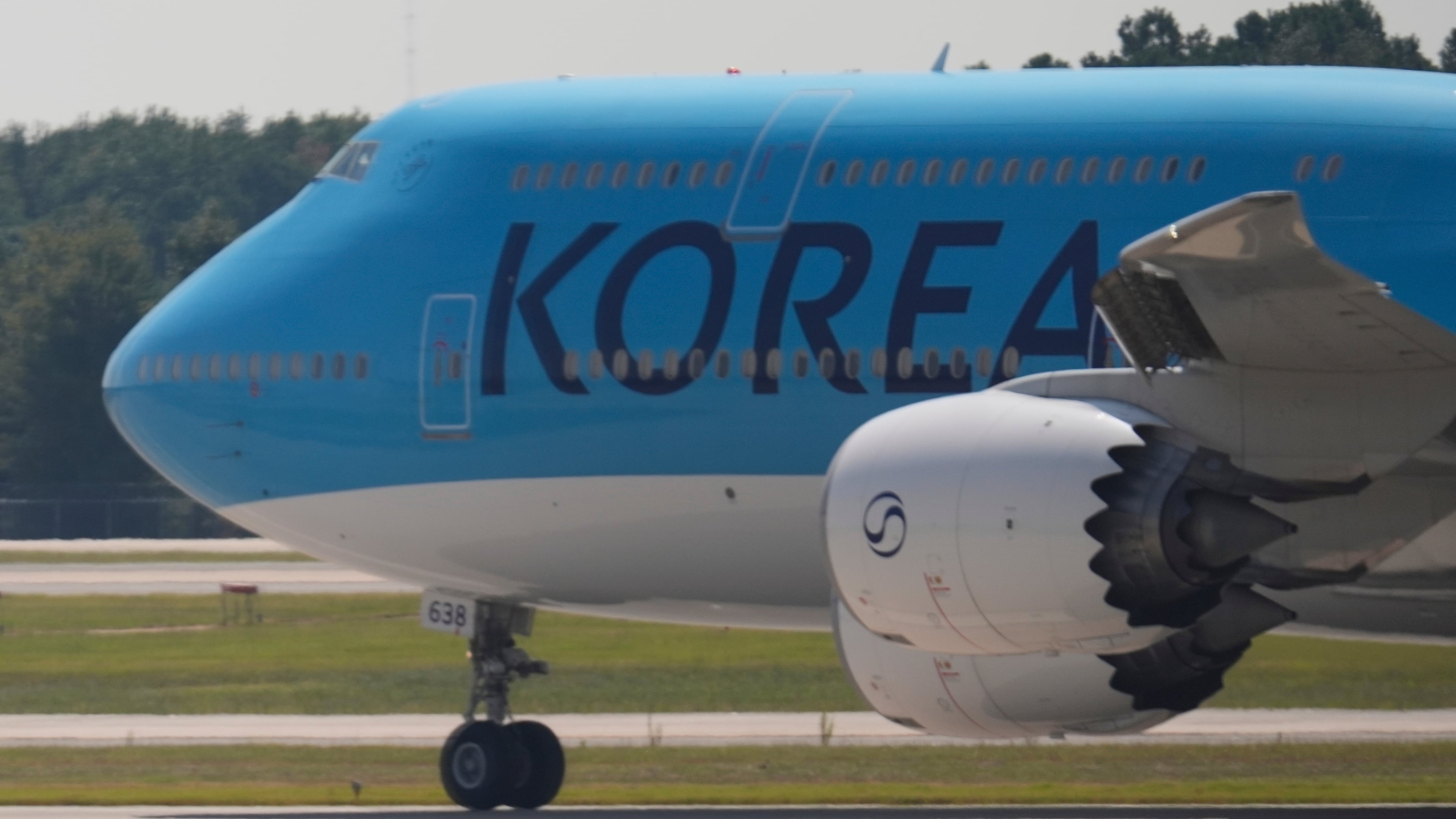 A Korean Air charter plane carrying Korean workers detained in immigration raid at Georgia factory leaves Hartsfield-Jackson International Airport in Atlanta bound for South Korea, Thursday, Sept. 11, 2025. (AP Photo/George Walker IV)