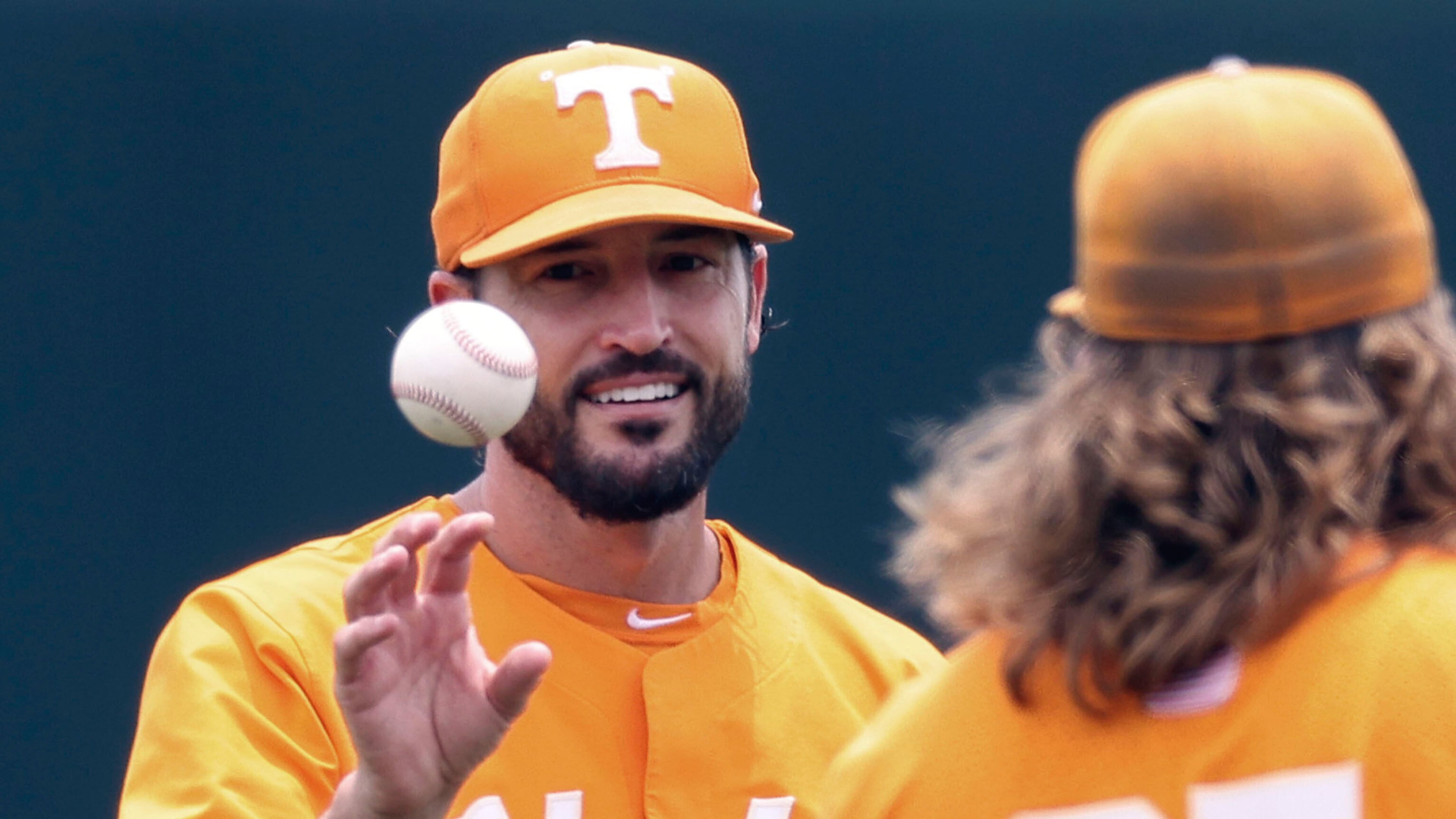 FILE - Tennessee head coach Tony Vitello, left, talks with pitcher Kirby Connell before an NCAA college baseball super regional game against Notre Dame, June 11, 2022, in Knoxville, Tenn. (AP Photo/Randy Sartin, File)