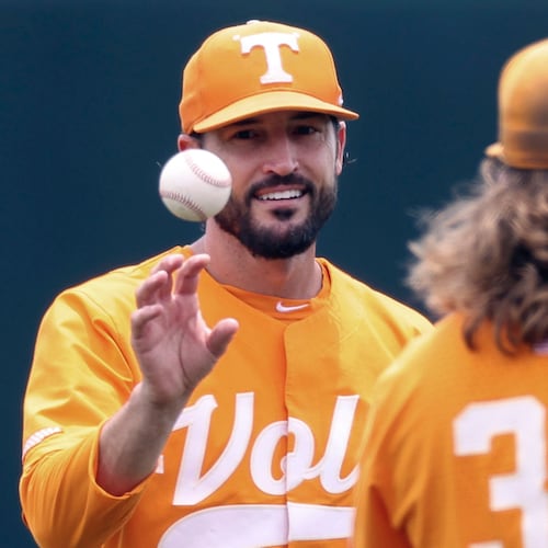 FILE - Tennessee head coach Tony Vitello, left, talks with pitcher Kirby Connell before an NCAA college baseball super regional game against Notre Dame, June 11, 2022, in Knoxville, Tenn. (AP Photo/Randy Sartin, File)