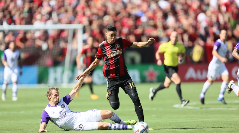 ATLANTA, GA - July 29 2017 Atlanta United midfielder Miguel Almiron (10) battle for position at Bobby Dodd Stadium on Saturday, July 29, 2017, in Atlanta, Ga.