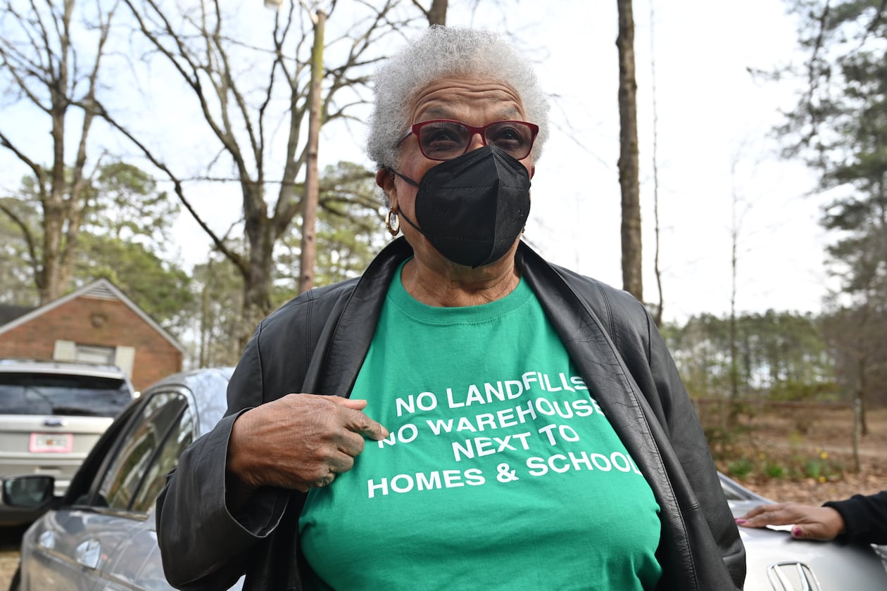 Former City of South Fulton Councilwoman Naeema Gilyard wearing a t-shirt discusses about an illegal landfill and raising concerns about air pollution levels, Friday, Feb. 10, 2023, in Fairburn. For years, former City of South Fulton Councilwoman Naeema Gilyard and other neighbors have been concerned about breathing smoke from the landfill, not to mention emissions from the steady stream of diesel big rigs that coming and going from warehouses that line South Fulton Parkway. Even with modern engines and cleaner fuel, exhaust from diesel trucks is known to contain a dangerous cocktail of air pollutants. (Hyosub Shin / Hyosub.Shin@ajc.com)