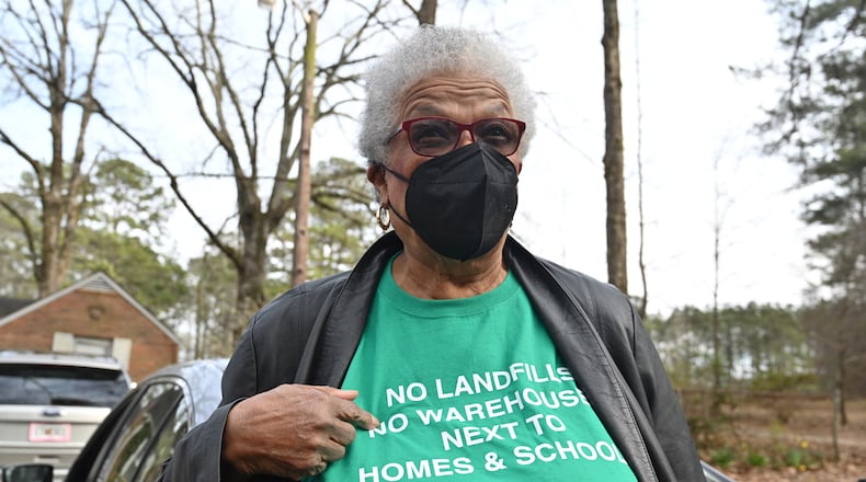 Former City of South Fulton Councilwoman Naeema Gilyard wearing a t-shirt discusses about an illegal landfill and raising concerns about air pollution levels, Friday, Feb. 10, 2023, in Fairburn. For years, former City of South Fulton Councilwoman Naeema Gilyard and other neighbors have been concerned about breathing smoke from the landfill, not to mention emissions from the steady stream of diesel big rigs that coming and going from warehouses that line South Fulton Parkway. Even with modern engines and cleaner fuel, exhaust from diesel trucks is known to contain a dangerous cocktail of air pollutants. (Hyosub Shin / Hyosub.Shin@ajc.com)