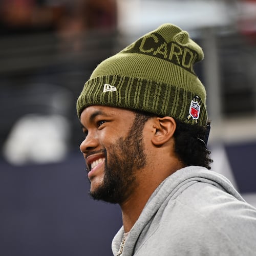 Arizona Cardinals quarterback Kyler Murray works out on the sideline before an NFL football game against the Dallas Cowboys, Monday, Nov. 3, 2025, in Arlington, Texas. (AP Photo/Jessica Tobias)