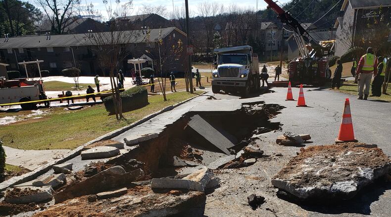 DeKalb County was working to repair a water main break outside the Twin Keys Apartment Homes on Briarwood Road Tuesday afternoon. SPECIAL PHOTO