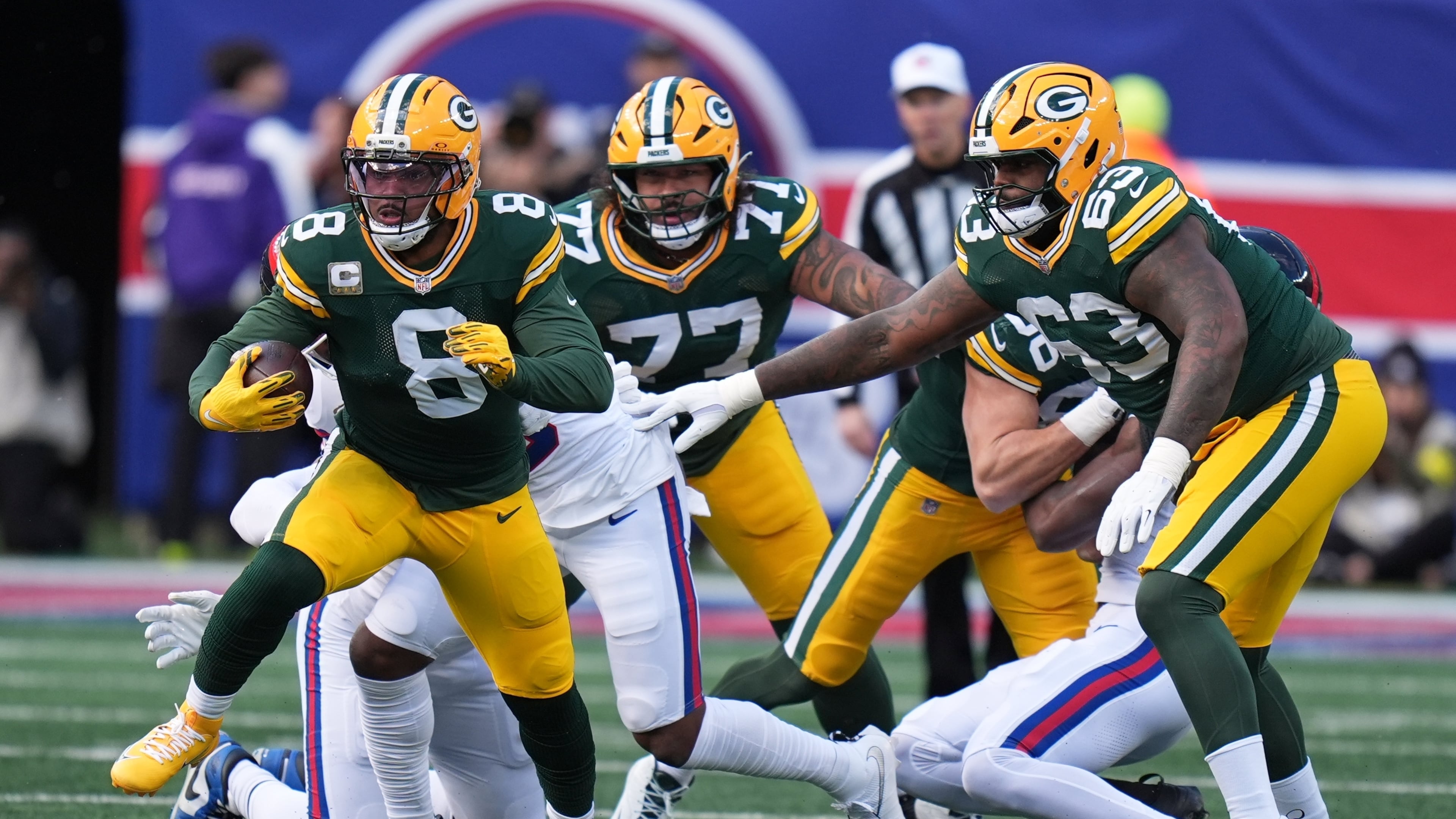 Green Bay Packers' Josh Jacobs runs for a first down during the first half of an NFL football game against the New York Giants Sunday, Nov. 16, 2025, in East Rutherford, N.J. (AP Photo/Seth Wenig)