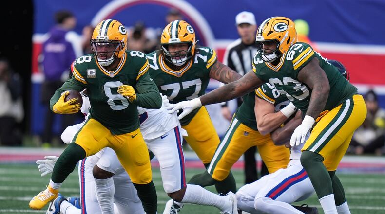 Green Bay Packers' Josh Jacobs runs for a first down during the first half of an NFL football game against the New York Giants Sunday, Nov. 16, 2025, in East Rutherford, N.J. (AP Photo/Seth Wenig)