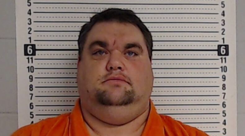 Former Rockdale County Sgt. Dan Lang, 37, was arrested in the theft of guns and cash from the agency’s evidence unit.