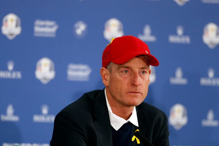 FILE - US team captain Jim Furyk attends the press conference of the losing team after Europe won the 2018 Ryder Cup golf tournament at Le Golf National in Saint Quentin-en-Yvelines, outside Paris, France, Sunday, Sept. 30, 2018. (AP Photo/Alastair Grant, file)