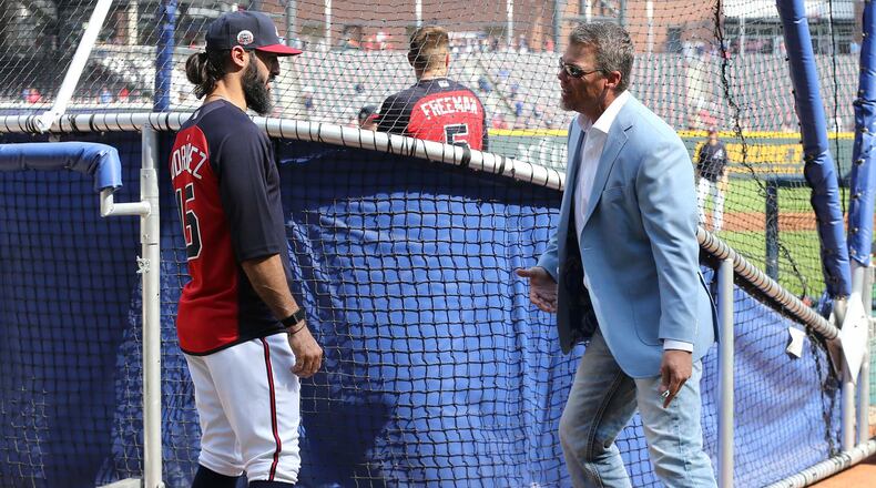April 14, 2017, Atlanta: Chipper Jones gives pitcher Paco Rodriguez some pointers during batting practice at the Braves home opener in their new stadium at SunTrust Park on Friday, April 14, 2017, in Atlanta. Curtis Compton/ccompton@ajc.com