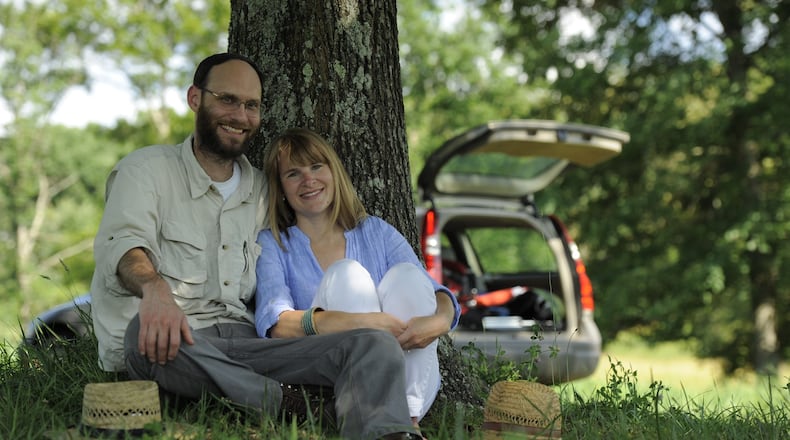 Noble Wine Cellar owners Jabe and Barbara Hilson take a pause from the harvest in the Upper Hiwassee Highlands in North Georgia. CONTRIBUTED BY JIM LORING