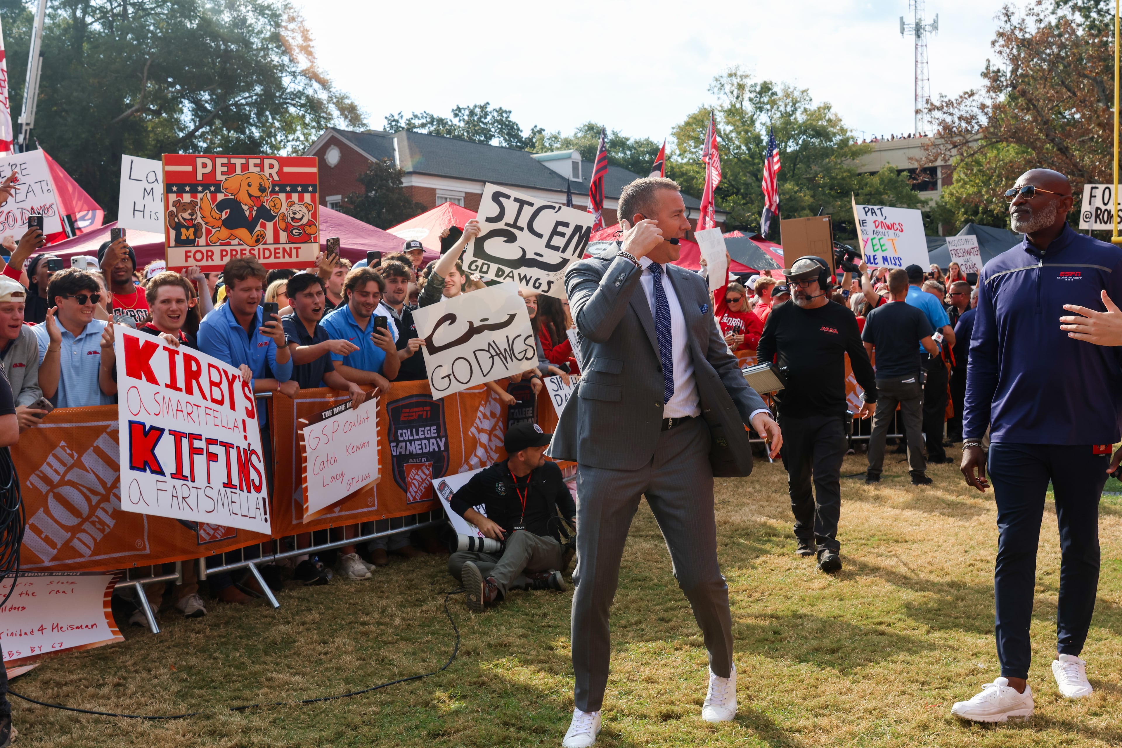 Kirk Herbstreit enters the area for the Pat McAfee Kicking Contest during the ESPN College GameDay broadcast from Myers Quad at UGA on Saturday, Oct. 18, 2025. (C.J. Bartunek for the AJC)