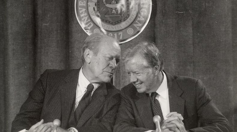 Former U.S. Presidents, Gerald Ford and Jimmy Carter, share a private moment in 1984. On Monday night, Carter won the 2017 Gerald R. Ford Medal for Distinguished Public Service (AP Photo/Detroit Free Press, Hugh Grannum) . On Monday night