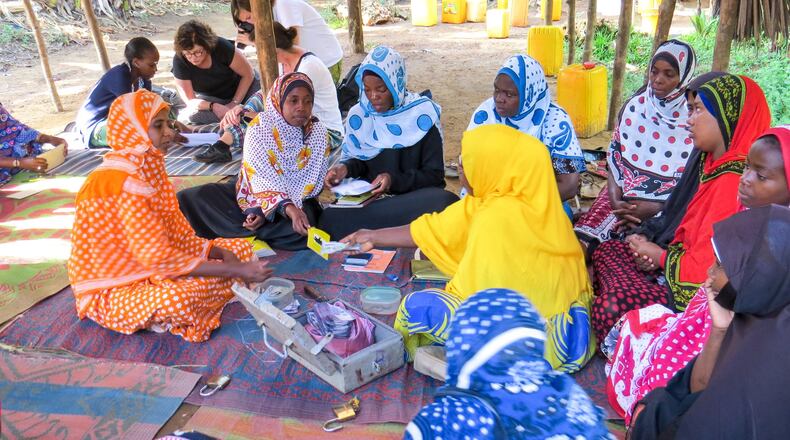 CARE has helped these women in Tanzania form micro businesses to help their families. CONTRIBUTED BY MARY KATE WILSON / CARE