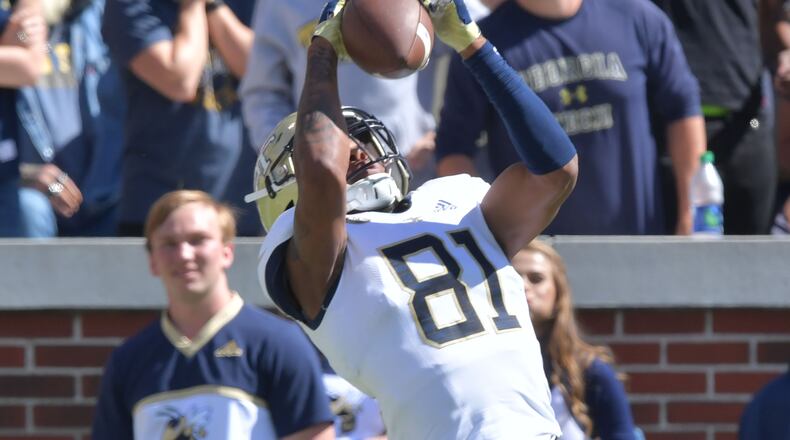 October 13, 2018 Atlanta - Georgia Tech wide receiver Malachi Carter (81) makes a touchdown reception in the first half at Bobby Dodd Stadium on October 13, 2018. HYOSUB SHIN / HSHIN@AJC.COM