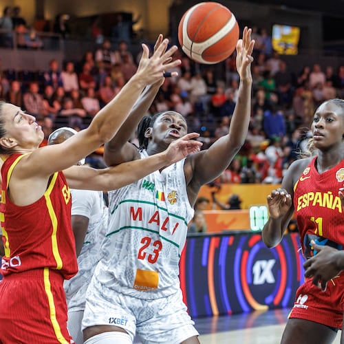 Mali's Sika Kone vies for the ball with Spain's Maite Cazorla, left, during the women's World Cup basketball match between Mali and Spain, in Berlin, Saturday, Sept. 5, 2026. (Andreas Gora/dpa via AP)