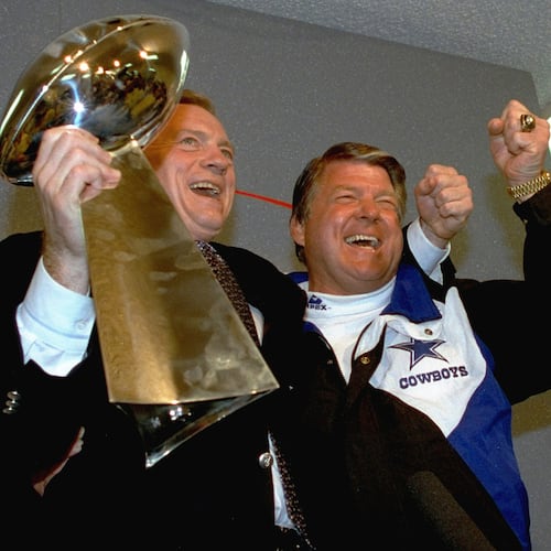 FILE - In this Jan. 31, 1993 file photo, Dallas Cowboys head coach Jimmy Johnson, right, and owner Jerry Jones, hold up the Vince Lombardi Trophy as they celebrate their 52-17 win over the Buffalo Bills in Super Bowl XXVII in Pasadena, Calif. (AP Photo/Rick Bowmer, File)