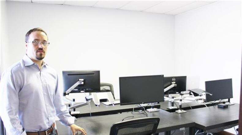 Josh Sweeney of GarageWorx shows off one of the Snellville offices inside the Clower Street business. Courtesy City of Snellville
