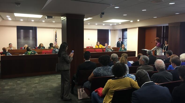 Elizabeth MacNamara of the League of Women Voters of Georgia, right, speaks Tuesday to the House Reapportionment Committee. MacNamara was supporting House Resolution 2, which would prohibit bias for or against political parties when the Georgia Legislature redraws political maps in 2022. MARK NIESSE / MARK.NIESSE@AJC.COM