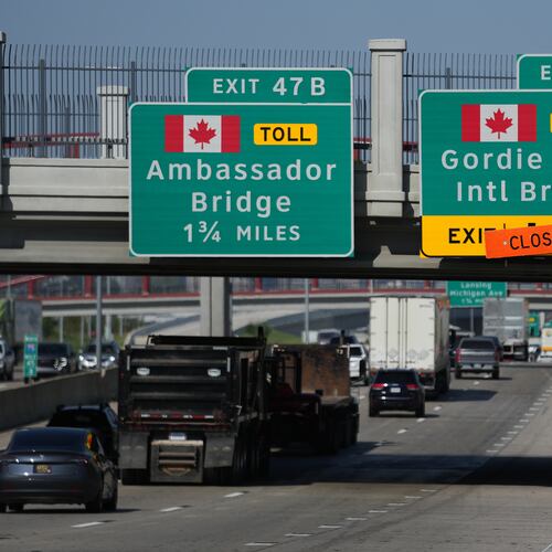 Exits from Interstate 75 are displayed for the Gordie Howe International Bridge and Ambassador Bridge connecting Windsor, Ontario, with Detroit, Tuesday, July 14, 2026, (AP Photo/Paul Sancya)