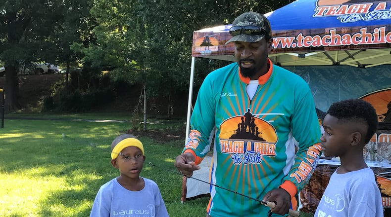 Fomer NFLer Kendall Newsome runs a nonprofit that teaches youth to fish and value the outdoors. CREDIT: SHELIA POOLE