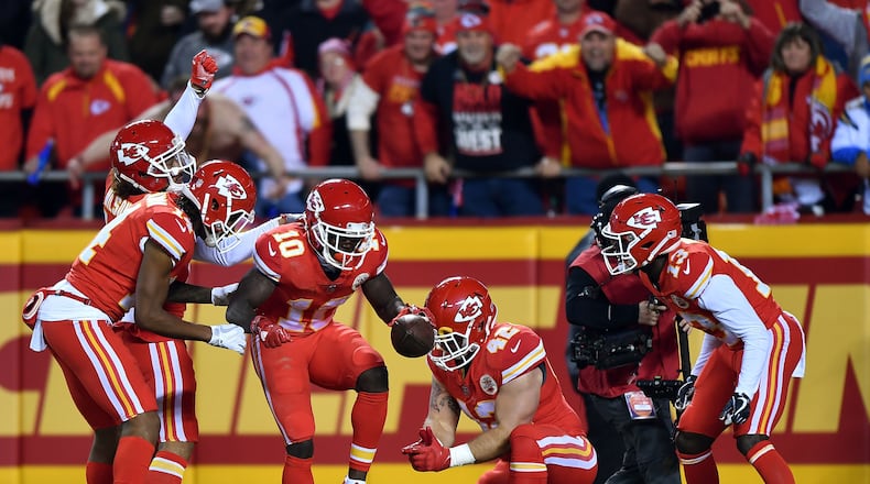 The Kansas City Chiefs break into an endzone act after a touchdown earlier this season. (Peter Aiken/Getty Images)