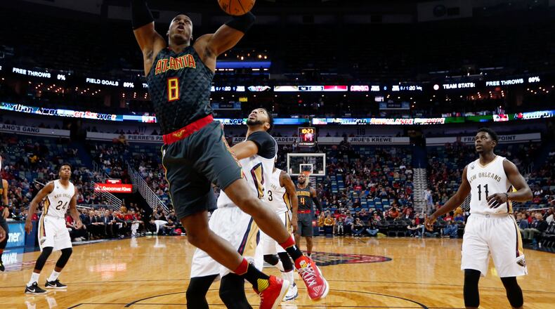 Atlanta Hawks center Dwight Howard (8) goes to the basket in front of New Orleans Pelicans forward Anthony Davis (23) in the first half of an NBA basketball game in New Orleans, Thursday, Jan. 5, 2017. (AP Photo/Gerald Herbert)
