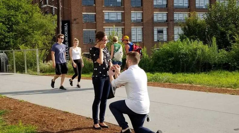 Peyton Momberger and Taylor Koshak got engaged on the Atlanta Beltline, with the help of Tiny Doors ATL.
