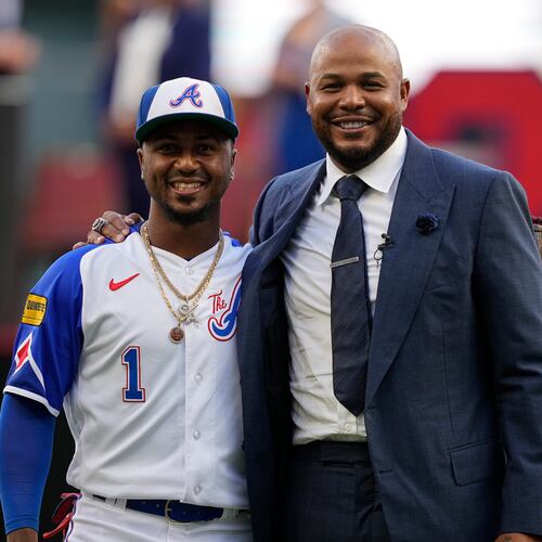Former Braves player Andruw Jones (right), shown with second baseman Ozzie Albies, is in “excellent position” to be an inductee in the 2026 class, according to Ryan Thibodaux's Baseball Hall of Fame Vote Tracker. (Brynn Anderson/AP 2023)