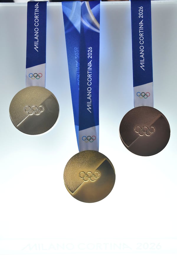 Milano Cortina 2026 Winter Olympics medals are displayed during the unveiling ceremony in Venice, Italy, Tuesday, July 15, 2025. (AP Photo/Luigi Costantini)