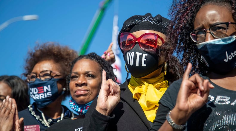 Members of the Alpha Kappa Alpha Sorority Inc., pose for a photo during a Biden-Harris rally in Atlanta’s Summerhill community, Monday, November 2, 2020. Democratic Vice President candidate Kamala Harris is a member of the Alpha Kappa Alpha Inc., sorority. (Alyssa Pointer / Alyssa.Pointer@ajc.com)
