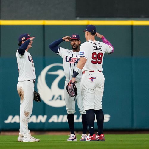 United States outfielders Roman Anthony, left to right, Byron Buxton and Aaron Judge celebrate after the team's victory over Mexico in a World Baseball Classic game, Monday, March 9, 2026, in Houston. (AP Photo/Ashley Landis)
