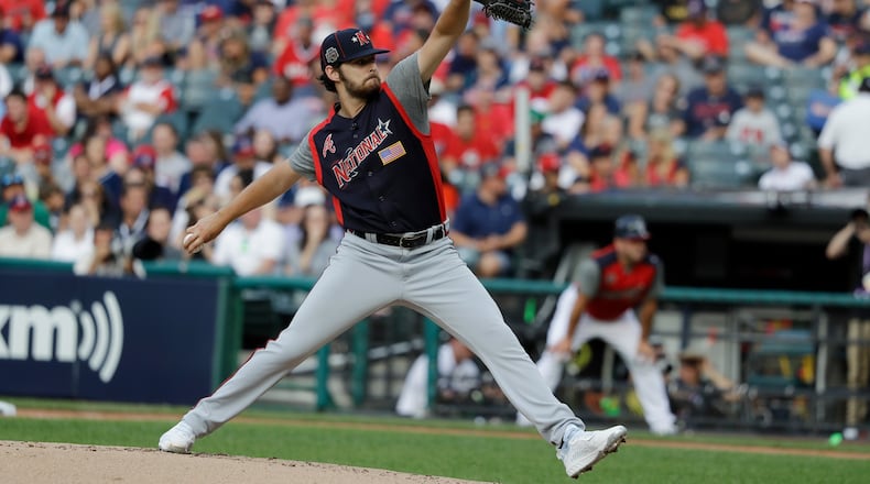 Ian Anderson, of the Atlanta Braves, throws during the first inning of the MLB All-Star Futures baseball game, Sunday, July 7, 2019, in Cleveland. The MLB baseball All-Star Game is to be played Tuesday. (AP Photo/Darron Cummings)