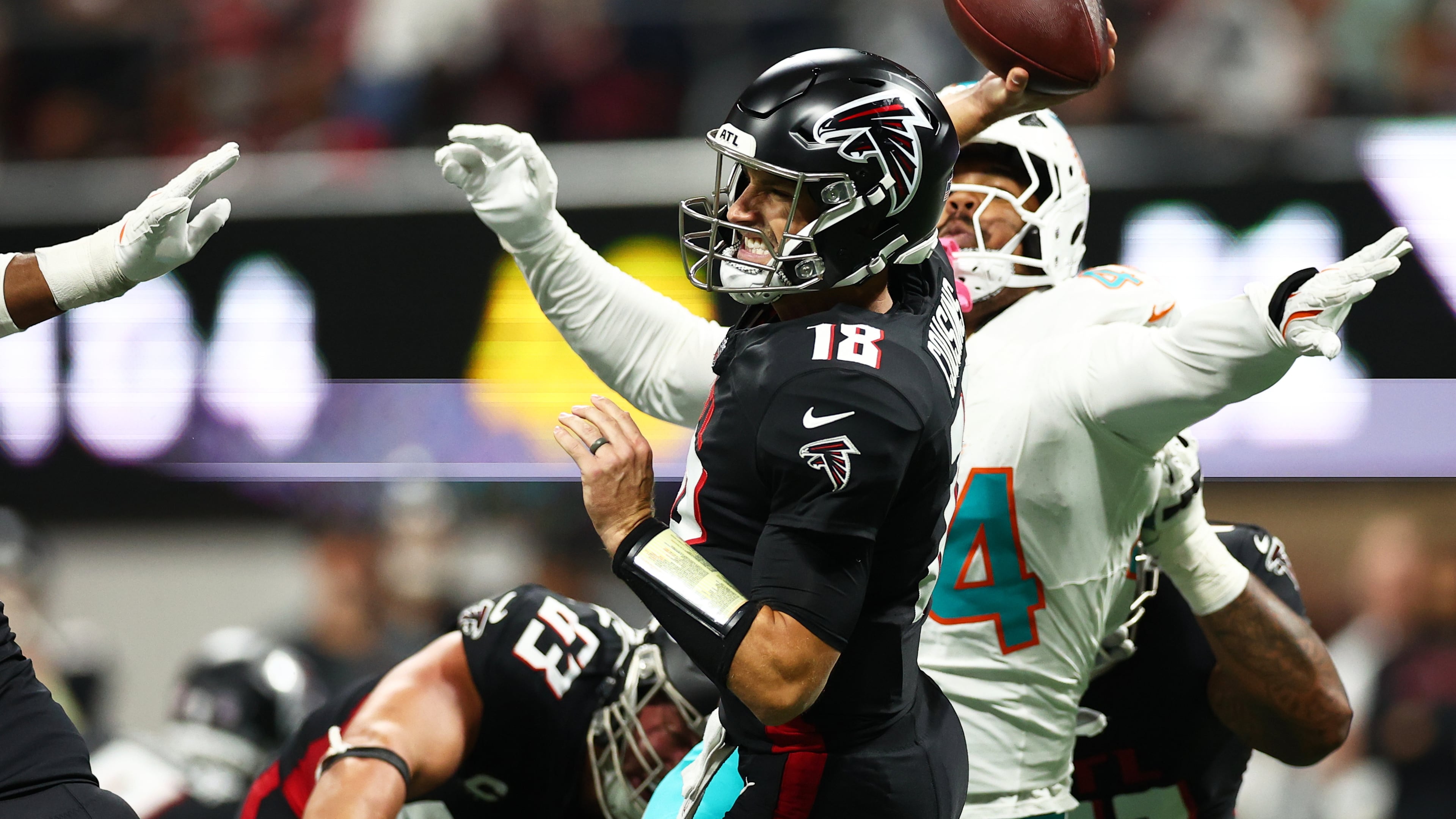 Atlanta Falcons quarterback Kirk Cousins (18) throws during the second half of an NFL football game against the Miami Dolphins, Sunday, Oct. 26, 2025, in Atlanta. (AP Photo/Colin Hubbard)