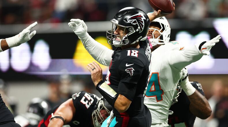 Atlanta Falcons quarterback Kirk Cousins (18) throws during the second half of an NFL football game against the Miami Dolphins, Sunday, Oct. 26, 2025, in Atlanta. (AP Photo/Colin Hubbard)