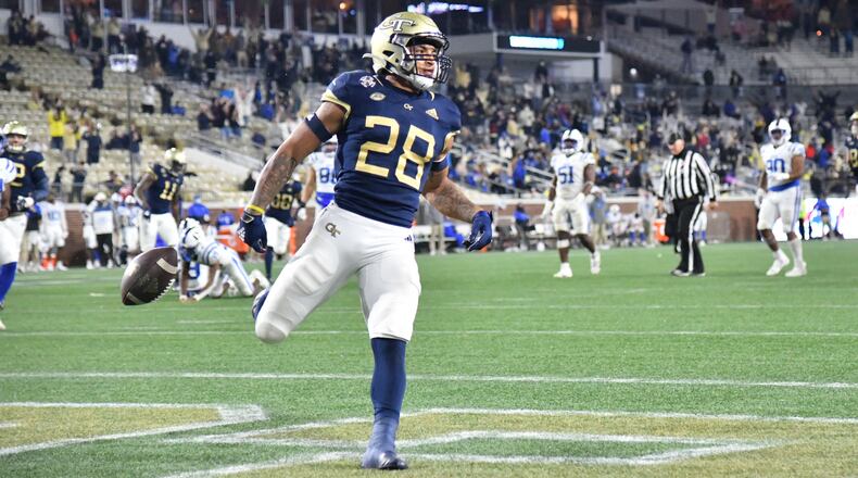 Georgia Tech running back Dontae Smith (28) scores a touchdown during the second half of a 56-33 victory over Duke during the 2020 season.