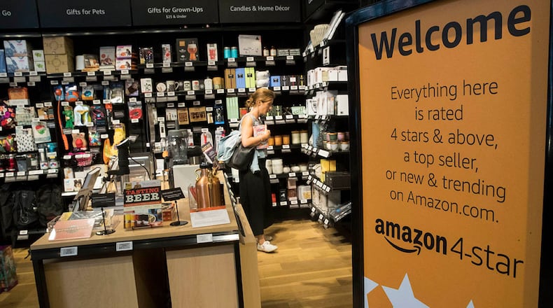 A shopper browses the items on display at the Amazon 4-star store in the Soho neighborhood of New York, Thursday, Sept. 27, 2018. (AP Photo/Mary Altaffer)