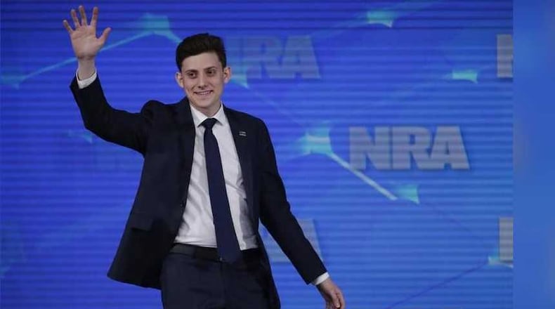 In this April 26, 2019 file photo, Kyle Kashuv, a survivor of the Marjory Stoneman Douglas High School shooting in Parkland, Fla., speaks at the National Rifle Association Institute for Legislative Action Leadership Forum in Indianapolis.