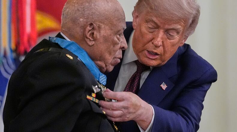 President Donald Trump presents the Medal of Honor to retired U.S. Marine Corps Maj. James Capers, Jr., during an East Room ceremony at the White House in Washington, Thursday, June 18, 2026 in Washington. (AP Photo/Manuel Balce Ceneta)