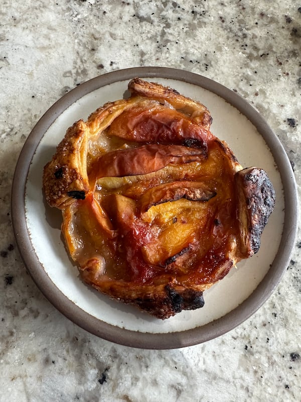 An overhead shot of a peach galette.