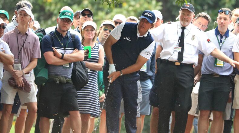 Phil Mickelson plays his second shot on the ninth hole during the second round of the 2018 Masters Tournament at Augusta National Golf Club on April 6, 2018 in Augusta, Georgia. (Photo by Andrew Redington/Getty Images)