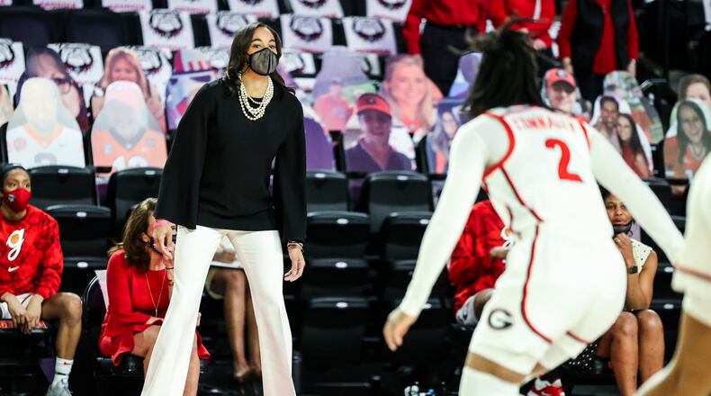 Georgia head coach Joni Taylor watches senior guard Gabby Connally at work in a win over Tennessee at Stegeman Coliseum on Sunday, Feb. 21, 2021. (Photo by Tony Walsh/UGA)