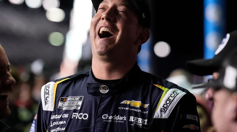 Kyle Busch speaks with his crew during NASCAR Daytona 500 qualifying, Wednesday, Feb. 11, 2026, in Daytona, Fla. (AP Photo/Mike Stewart)