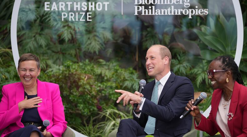 FILE - Britain's Prince William smiles as panelists Hannah Jones, left, and Earthshot Prize Chief Executive, Tokunboh Ishmael attend an Earthshot Prize Innovation Camp in London, on June 27, 2024. (AP Photo/Kin Cheung, Pool File)