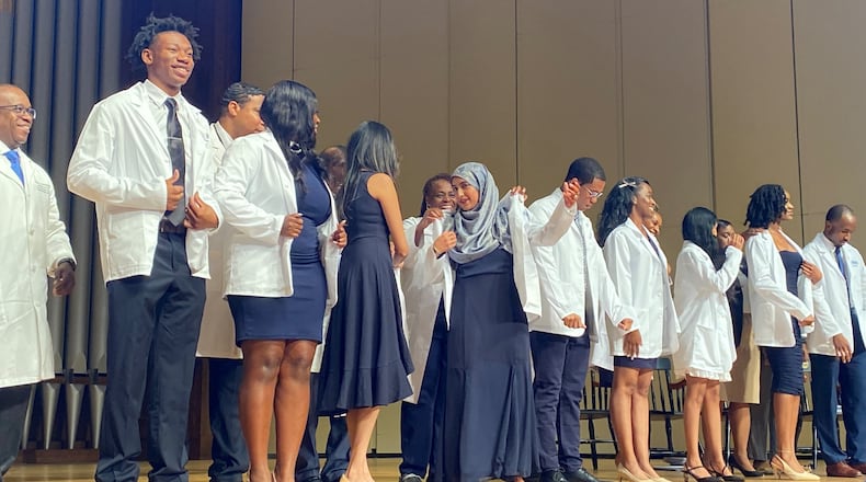 Morehouse School of Medicine students in their first months of medical school attended their white coat ceremony, a convocation where they get short versions of doctor's coats to wear in clinical settings. U.S. Secretary of Health and Human Services Xavier Becerra gave the address at the event, on Friday, September 20, 2024. (Photo by Ariel Hart.)