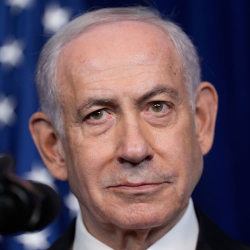 Israel's Prime Minister Benjamin Netanyahu listens during a news conference with President Donald Trump at Mar-a-Lago, Monday, Dec. 29, 2025, in Palm Beach, Fla. (AP Photo/Alex Brandon)