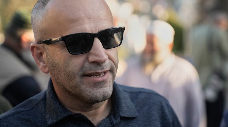 Loui Ridi, an Ohio-based Palestinian-American landlord of one of the homes besieged by Israeli settlers for over a week, arrives at his parent's home upon his return from the U.S., in the occupied West Bank village of Qusra, south of Nablus, Monday, Aug. 17, 2026. (AP Photo/Majdi Mohammed)