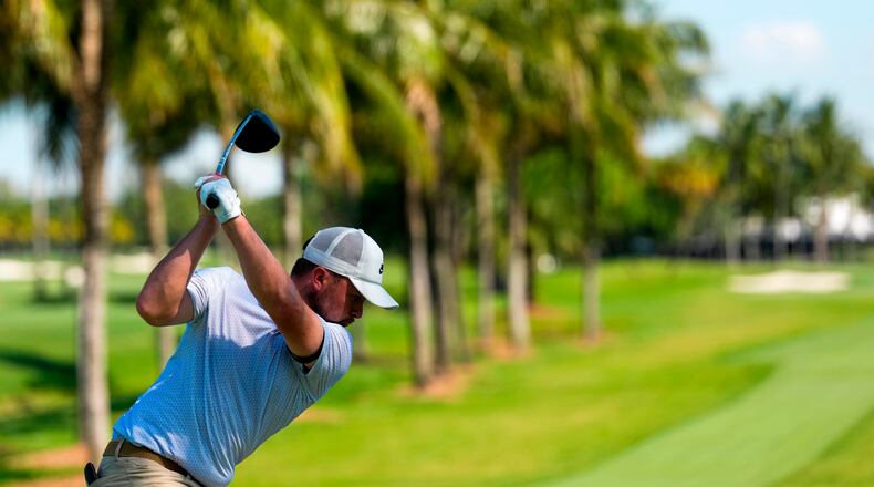 Alex Fitzpatrick, of England, hits from the seance tee during the second round of the Cadillac Championship PGA golf tournament Friday, May 1, 2026, in Doral, Fla. (AP Photo/David J. Phillip)